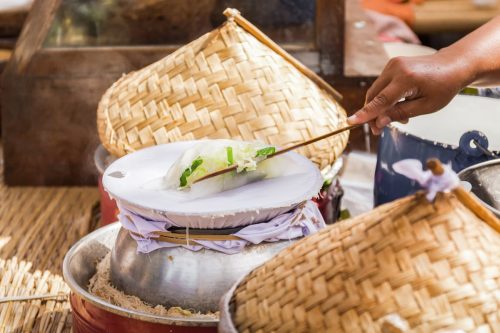 Cooking a dish in Sukhothai